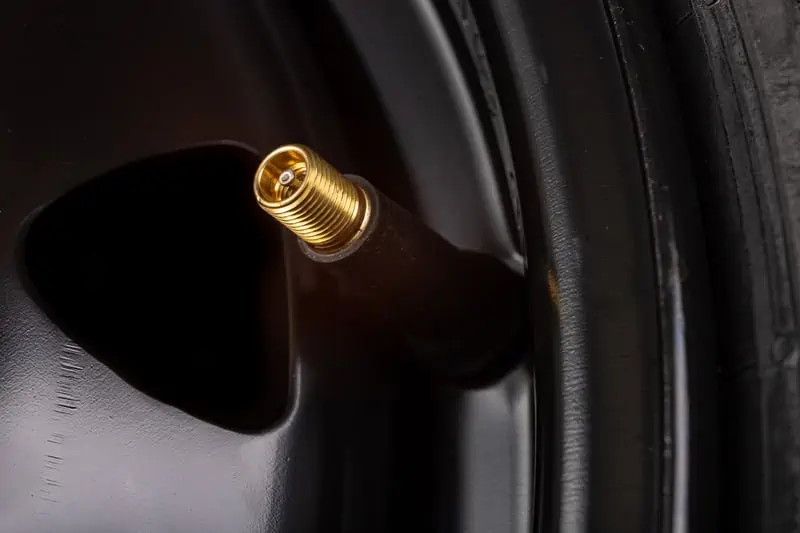 Commercial truck on highway — in-valve TPMS sensor wholesale sourcing guide for automotive distributors