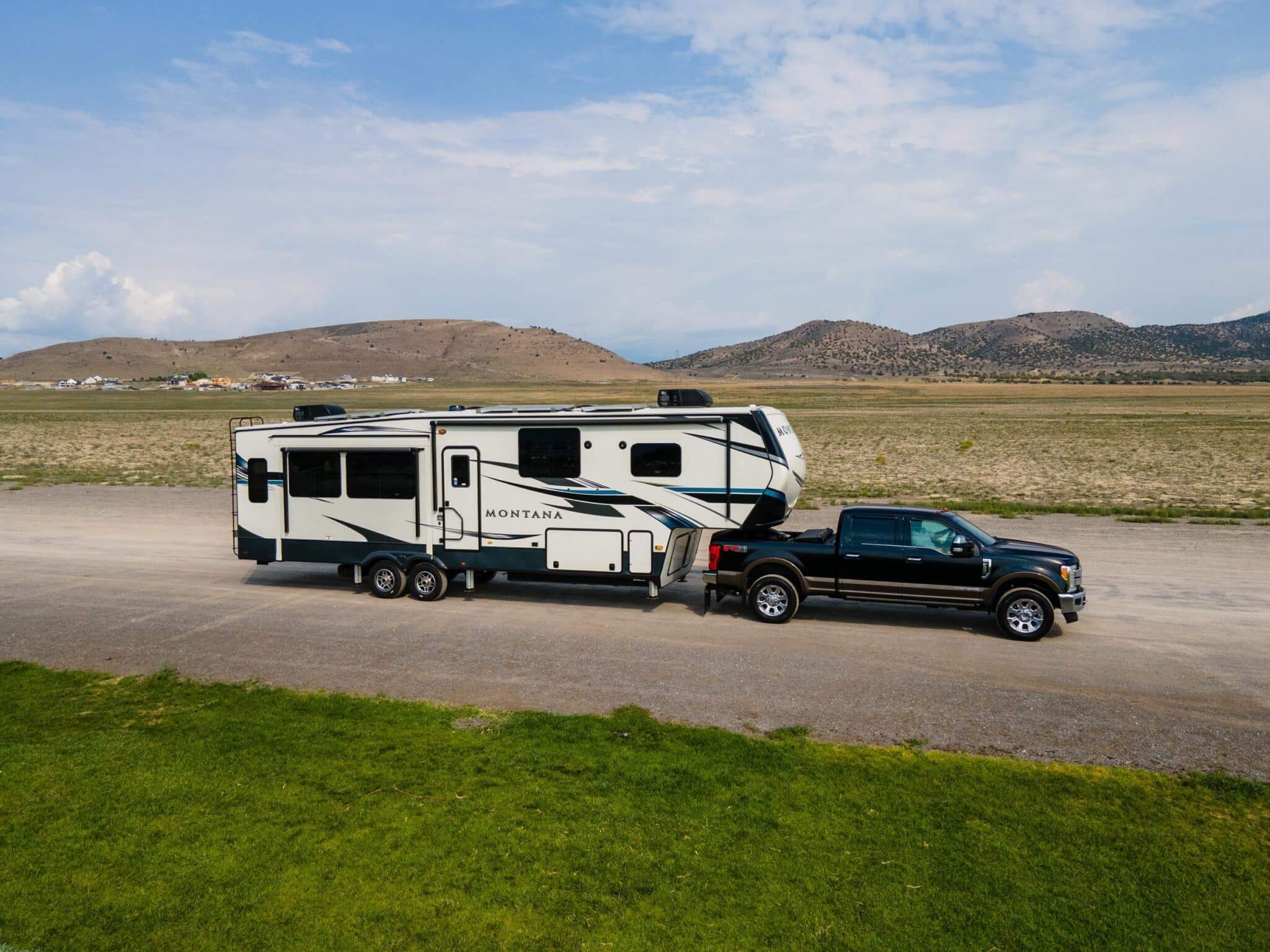 RV combination motorhome and trailer — full wheel coverage requires multi-sensor TPMS with repeater