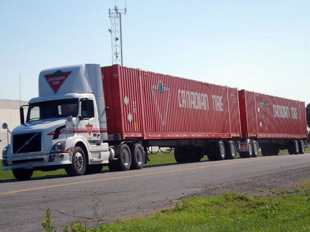 Travel trailer on highway — private label TPMS builds distributor brand with every unit placed