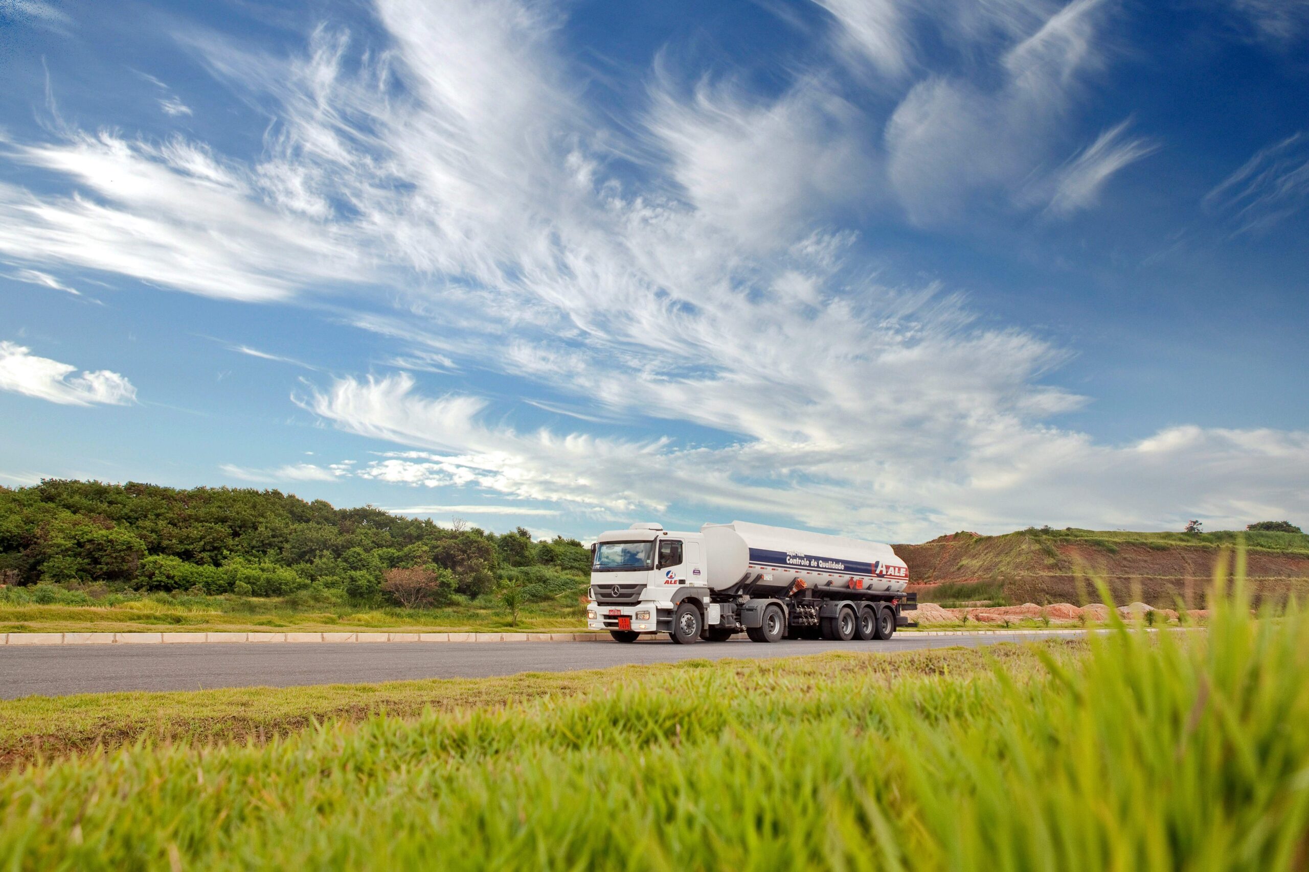 Modern coach bus rear view — 12-wheel TPMS sensor configuration for heavy-duty passenger transport